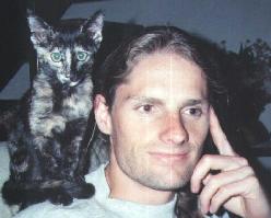 Craig and the coolest cat in the world, Toby, from sometime in the early 90's